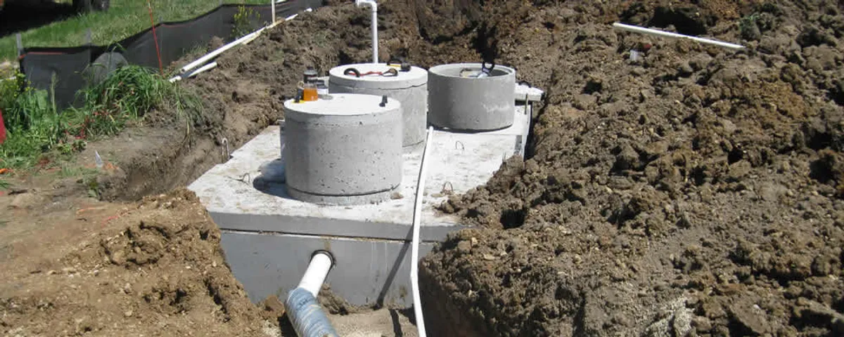 Septic system repair and installation site with tank access ports in La Jolla, CA